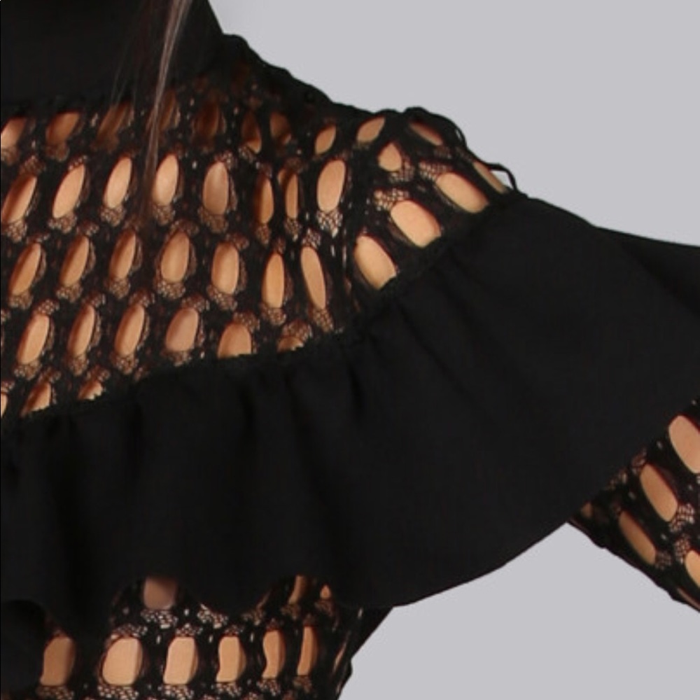 Black fishnet shirt.